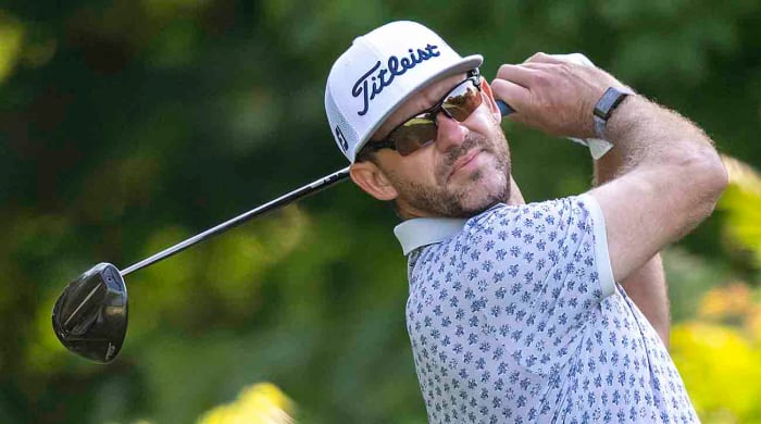 Lanto Griffin tees off during the 2023 John Deere Classic.